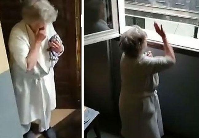 Vídeo: mulher de 82 anos em quarentena por coronavírus ganha parabéns da janela